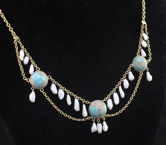An Edwardian 9ct gold cabochon turquoise and baroque pearl drop necklace, 15.5in.